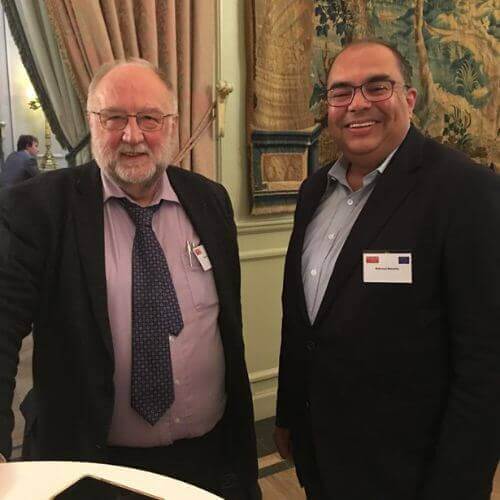 Dr. Mahmoud Mohieldin at a reception with a fellow delegate